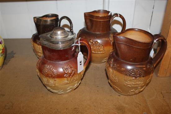 2 Doulton salt-glazed hunting jugs, one with silver rim (1 af), another jug with plated cover & J. Smith? jug with haystack sprig